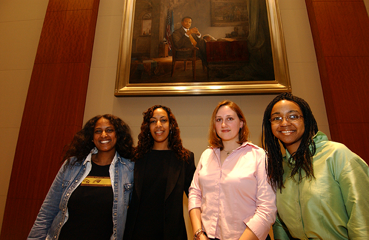 Students of Andrew Young School of Policy Studies pose at the unveiling